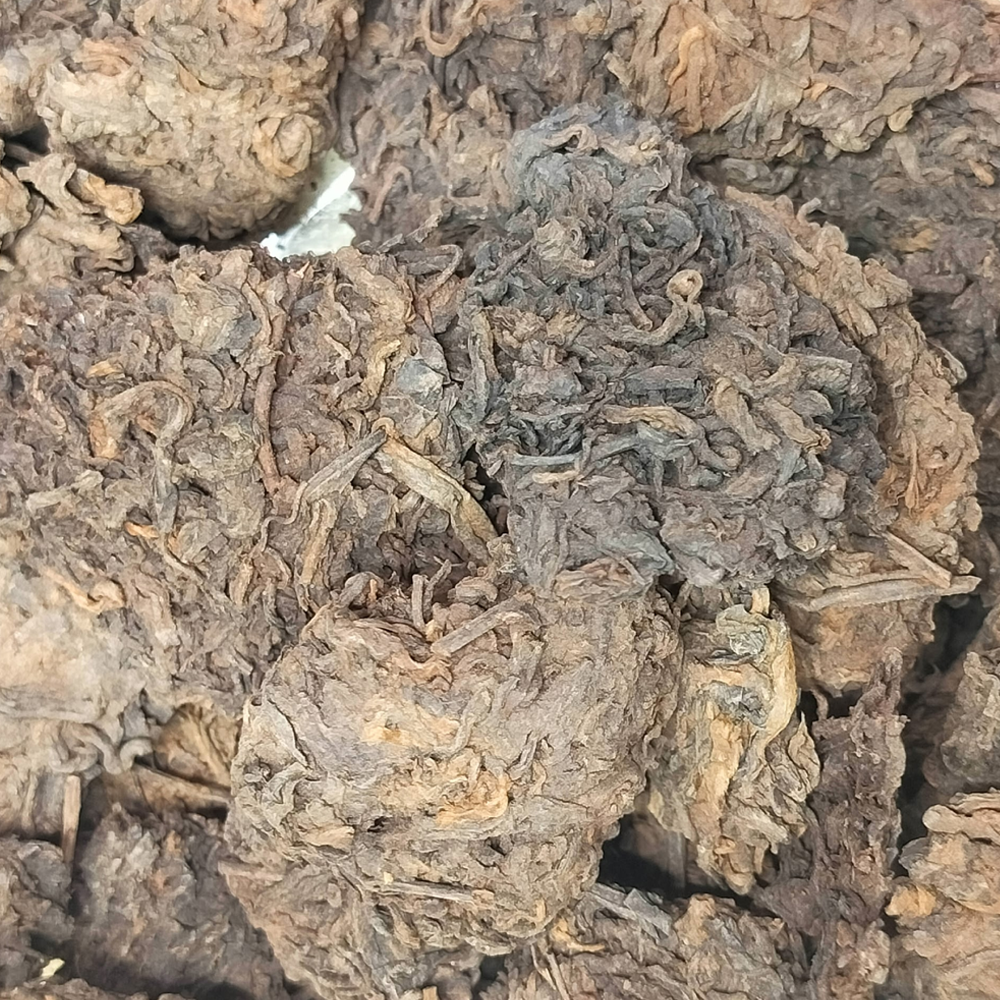 Шу Пуэр Лао Ча Тоу (普洱老茶头）